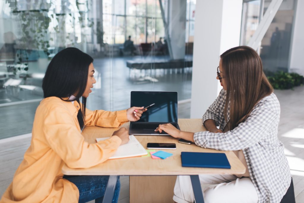 Business women working at desk in office